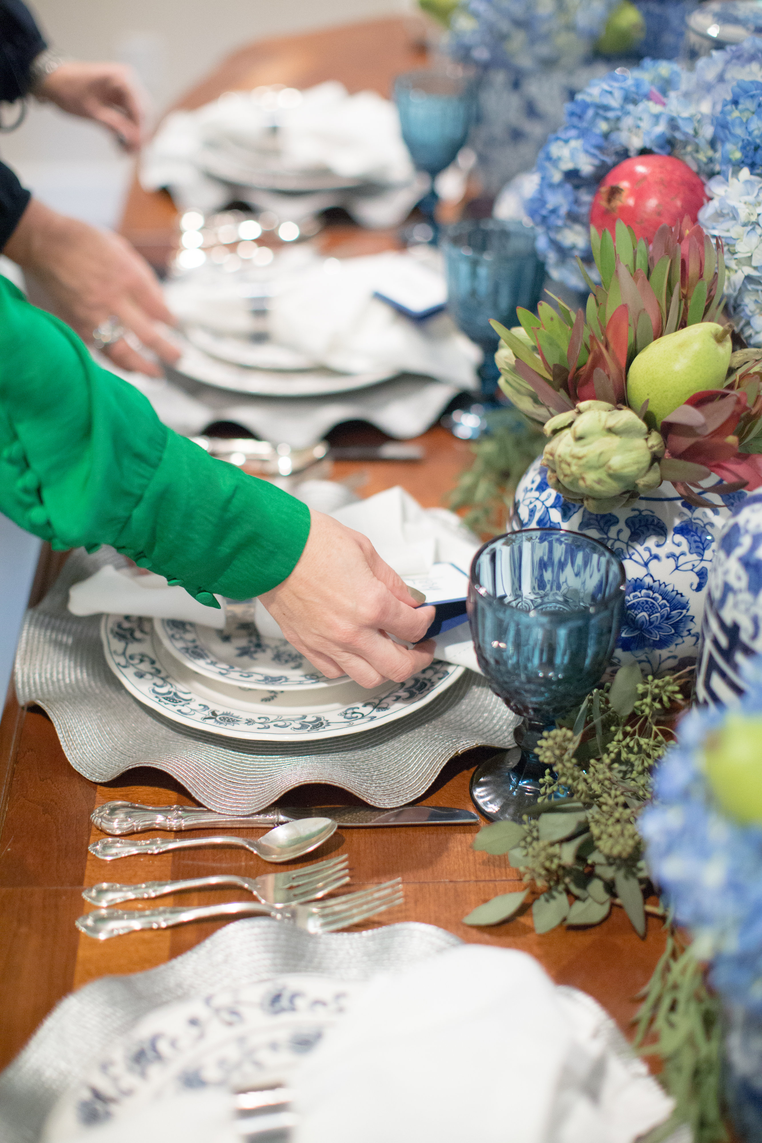 Silver placemats and vintage silver flatware