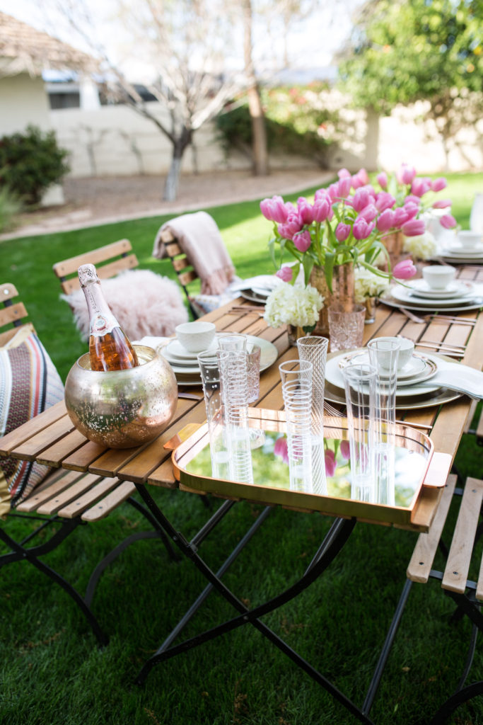 stylish rose gold Easter brunch table setting