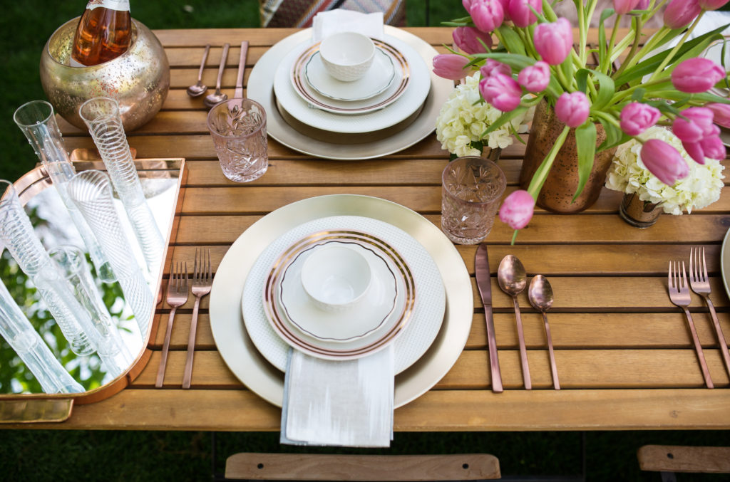 stylish rose gold Easter brunch table setting