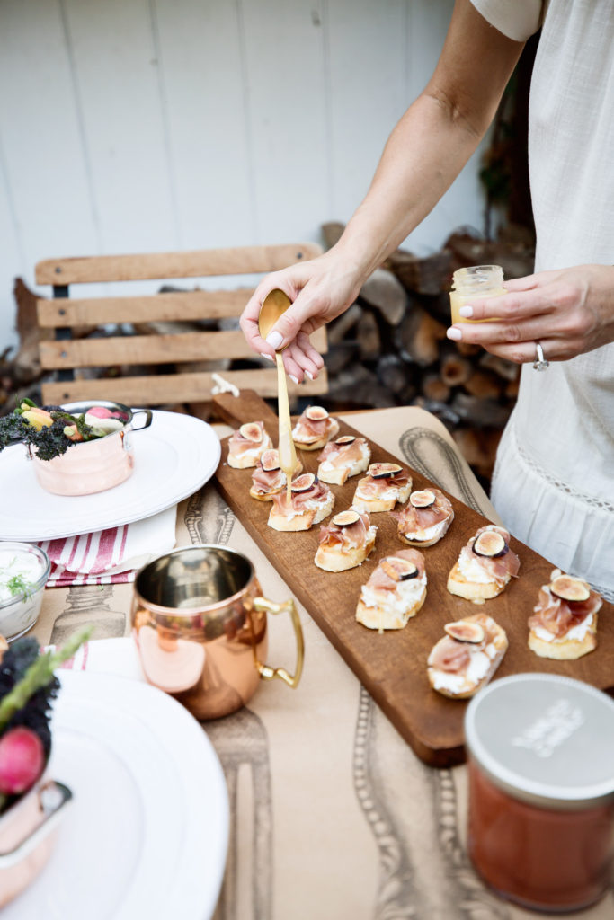 farmer's market party table with food and decor