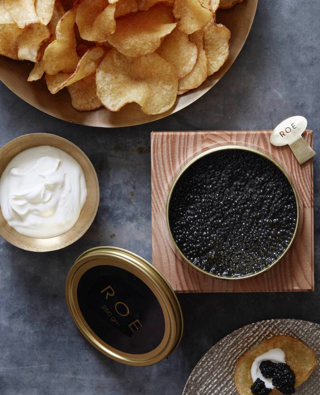Junk food such as potato chips coupled with champagne and caviar is an amazing surprise